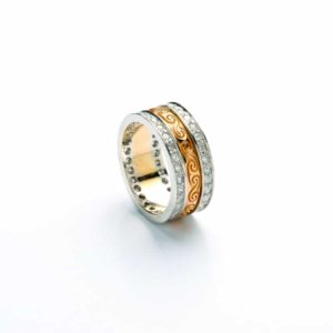 Gold Newgrange Spirals Engraved Narrow Ladies Band